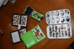 Four Plastic Fly Boxes and an Aluminium Compartmented Fly Box Containing Assorted Flies
