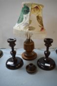 Candlesticks and a Wooden Table Lamp