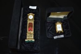 Two Miniature Glass Clocks