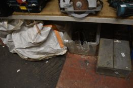 Contents of Undershelf Including Assorted Piping, Tools, and Fittings