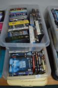 Two Storage Containers of DVDs