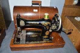 Singer Portable Manual Sewing Machine with Oak Cas