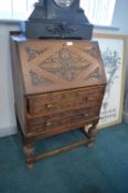 Small 1930's Carved Oak Bureau