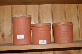 Three Terracotta Tea and Sugar Canisters