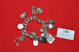 Sterling Silver Charm Bracelet with Assorted Silve