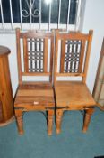 Two Solid Wood Chairs with Metal Grill Backs