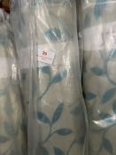 *28m X 1.4m Roll of Natural And Teal Coloured Leaf Design Curtain Fabric