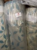 *33m X 1.4m Roll of Natural And Teal Coloured Leaf Design Curtain Fabric