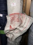 *28m X 1.4m Roll of Red And Natural Coloured Curtain Type Fabric