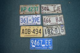 Seven Metal American Registration Plates