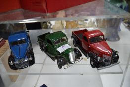Three Diecast Model Trucks