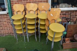 Eighteen Stacking Chairs