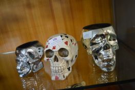 Two Squirrel Candle Holders and One Other