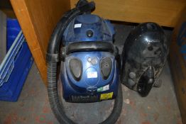 Two Vacuum Cleaners