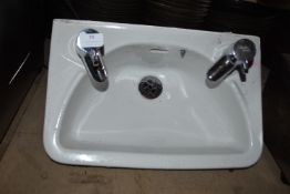 White Ceramic Basin with Taps
