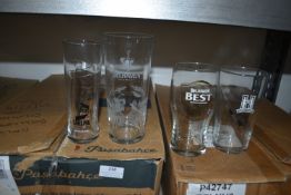Contents of Shelf Including an Assortment of Pint and Half Pint Glasses