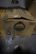 Twenty-Four Amstel Pint Glasses