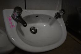 White Ceramic Basin with Taps