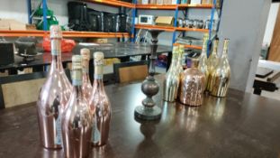 *Decorative Bottles, Cooper Jug, and a Candlestick