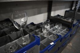 Contents of Shelf Including an Assortment of Glasses