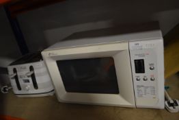 Daewoo Microwave and a Delonghi Four Slice Toaster
