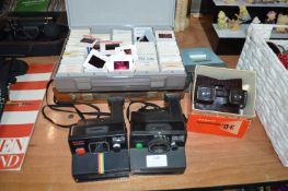 Two Polaroid Cameras, Viewers, and Slides
