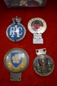 Four Vintage Car Badges