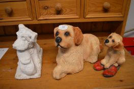 Three Painted Concrete Dogs