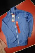 Champion Kid’s Light Blue Hoodie Size: 9-10 years