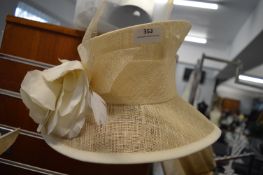 *Lady’s Cream Hat with Flower & Feather Decoration