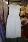 *Tiana Child’s White Bridesmaid Dress Size: 7 years RRP: £135