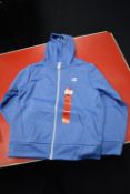 Champion Kid’s Light Blue Hoodie Size: 9-10 years