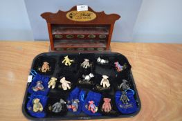 Seventeen Steiff Miniature Diecast Jointed Teddy Bears and Display Stand