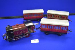 Hornby 101 Clockwork Loco 1940’s with Two Passenger Carriages, and a cart Van