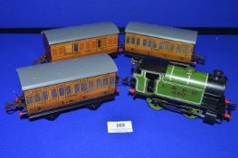 Hornby O Gauge Clockwork Loco 101 plus Two Passenger and Brake Van