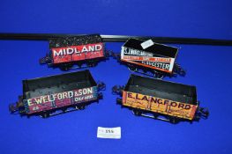 Four 0 Series Gauge Open Top Goods Wagons