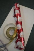 *Part Roll of Kirkland Double Sided Christmas Gift Wrap, and a Reel of Gold Ribbon