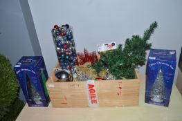 Assortment of Christmas Decorations and Mini Trees