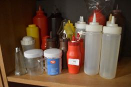 Quantity of Shakers and Plastic Condiment Bottles