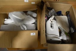 Contents of Two Boxes Including Measuring Spoons, Can Opener, Plastic Cutlery, etc.