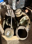 A box of Edwardian brass lamps.