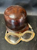 An early helmet with attached goggles (for decorative purpose only)