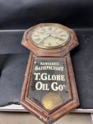 A Diamond Black Leather Oil advertising clock for T. Globe Oil Co.