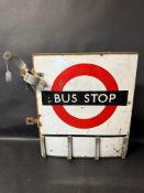 A Bus Stop double sided bracket sign with Fare Stage attachment, 20 1/2
