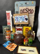 An autojumbler's lot of tins, a helmet, gunk, a US license plate, Servol can etc.