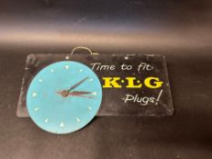 A K.L.G Plugs tin advertising clock, 18 x 8