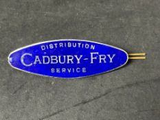 A very rare Cadbury-Fry Distribution Service cap badge, 3 1/4