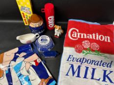 A selection of kitchen advertising including a Tetley biscuit barrel, Tetley aprons (2), Tetley oven