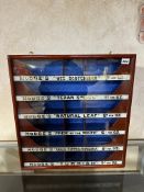 A Hodge's glass fronted dispensing cabinet with six side opening drawers, 20