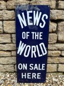 A News of The World On Sale Here rectangular enamel sign, 12 x 30